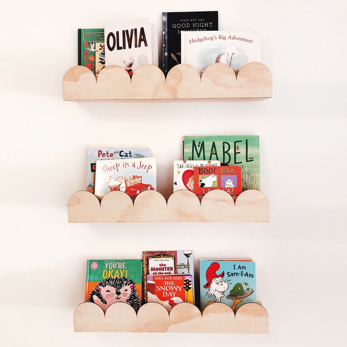 Featuring 3 pieces of the arch or scallop kids bookshelf with the child's favourite books inside them