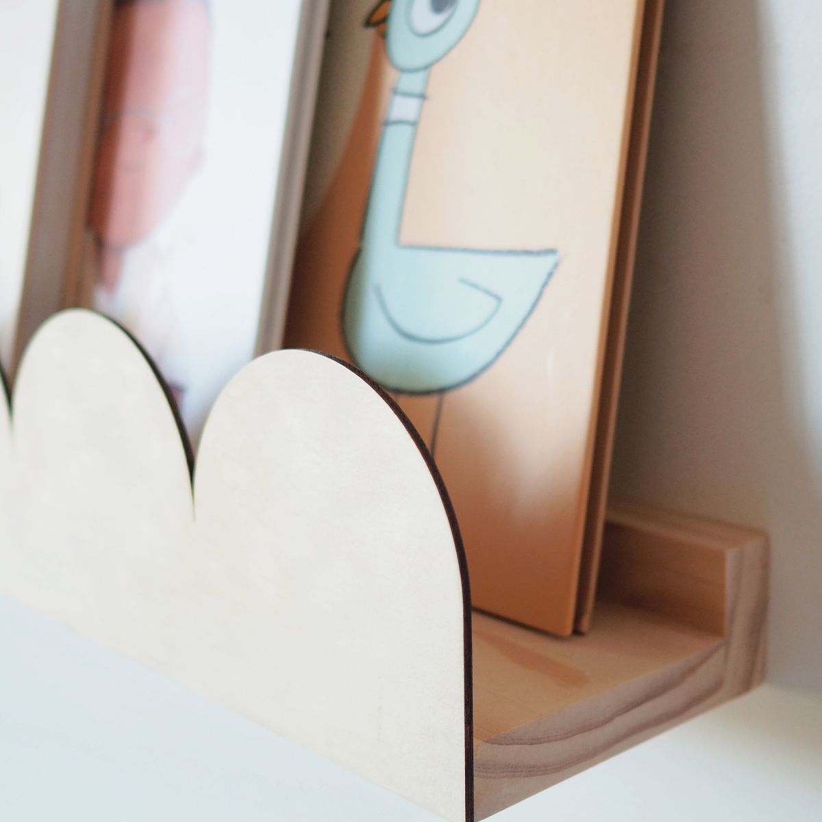 A close up look of the arch kids bookshelf showing the space available for the books