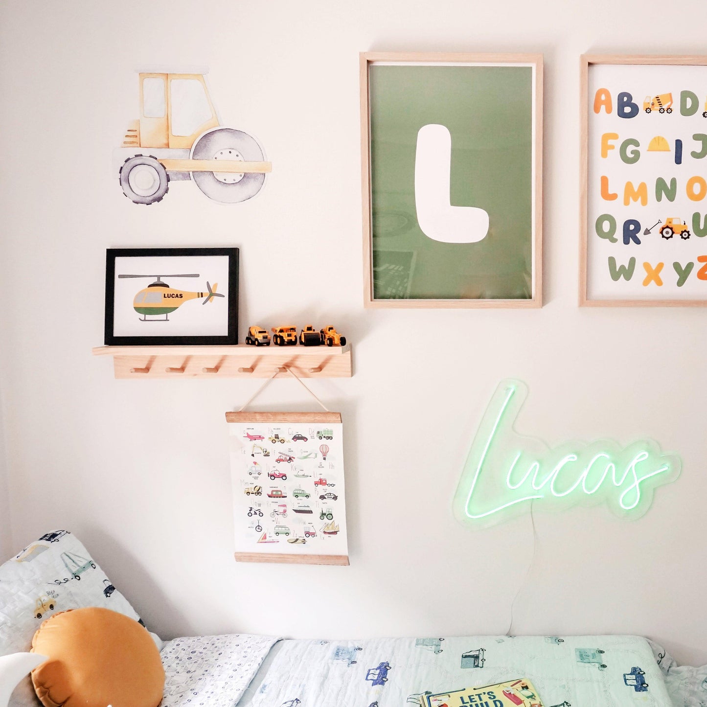 This is a pine wood nursery shelf where you can display in your boy's room