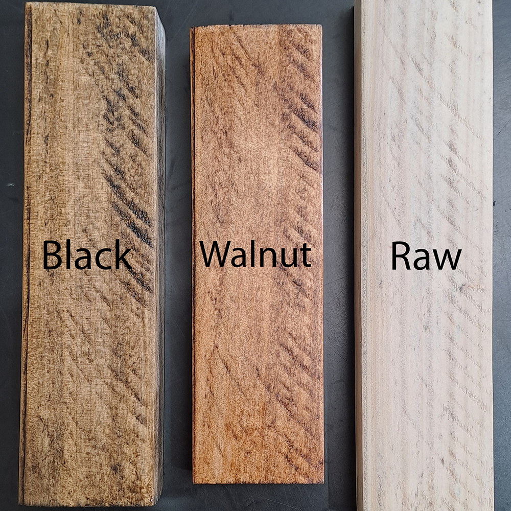 Three wooden planks labeled 'Black', 'Walnut', and 'Raw' on a dark background.