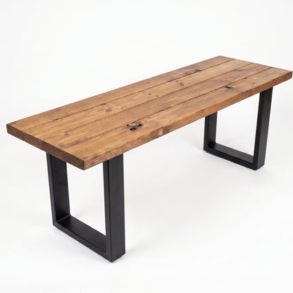 Wooden bench with black metal legs on a white background