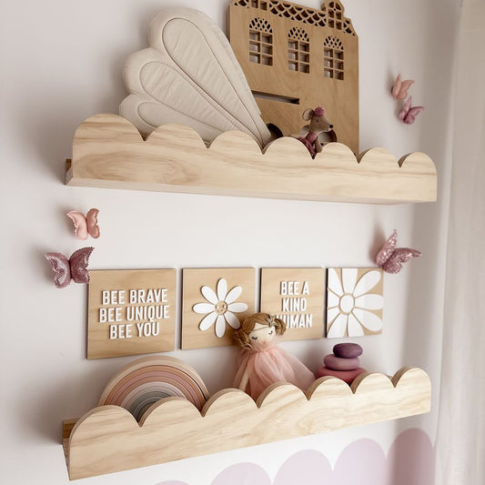 This is a scallop style wall shelf for the kids bedroom